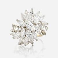 A diamond, platinum, and white metal ring