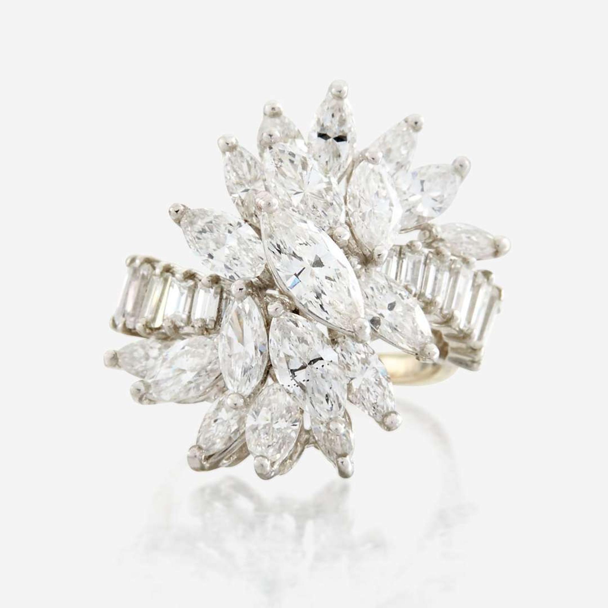 A diamond, platinum, and white metal ring