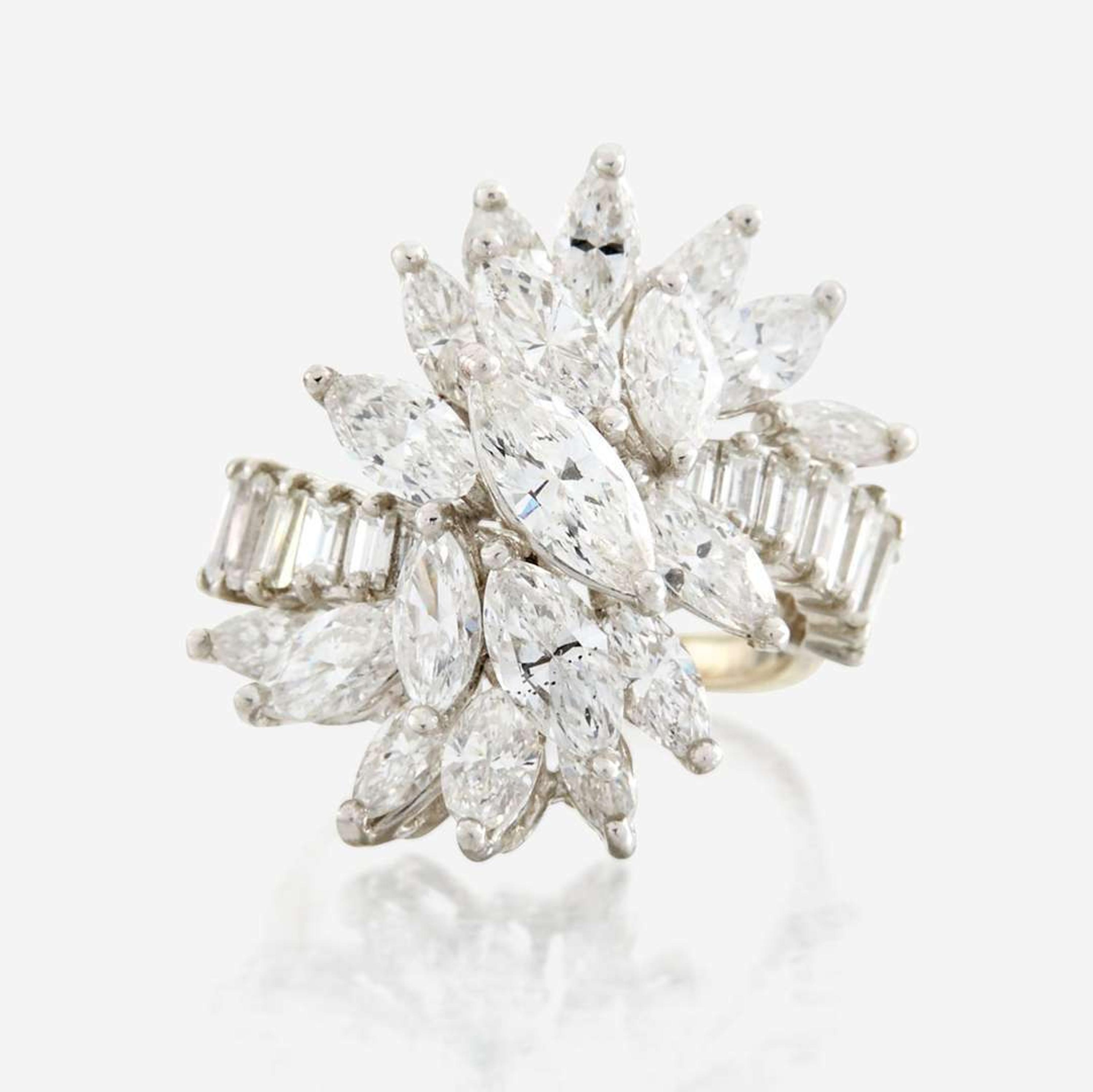 A diamond, platinum, and white metal ring