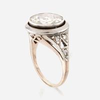 A diamond, sterling silver, and gold ring