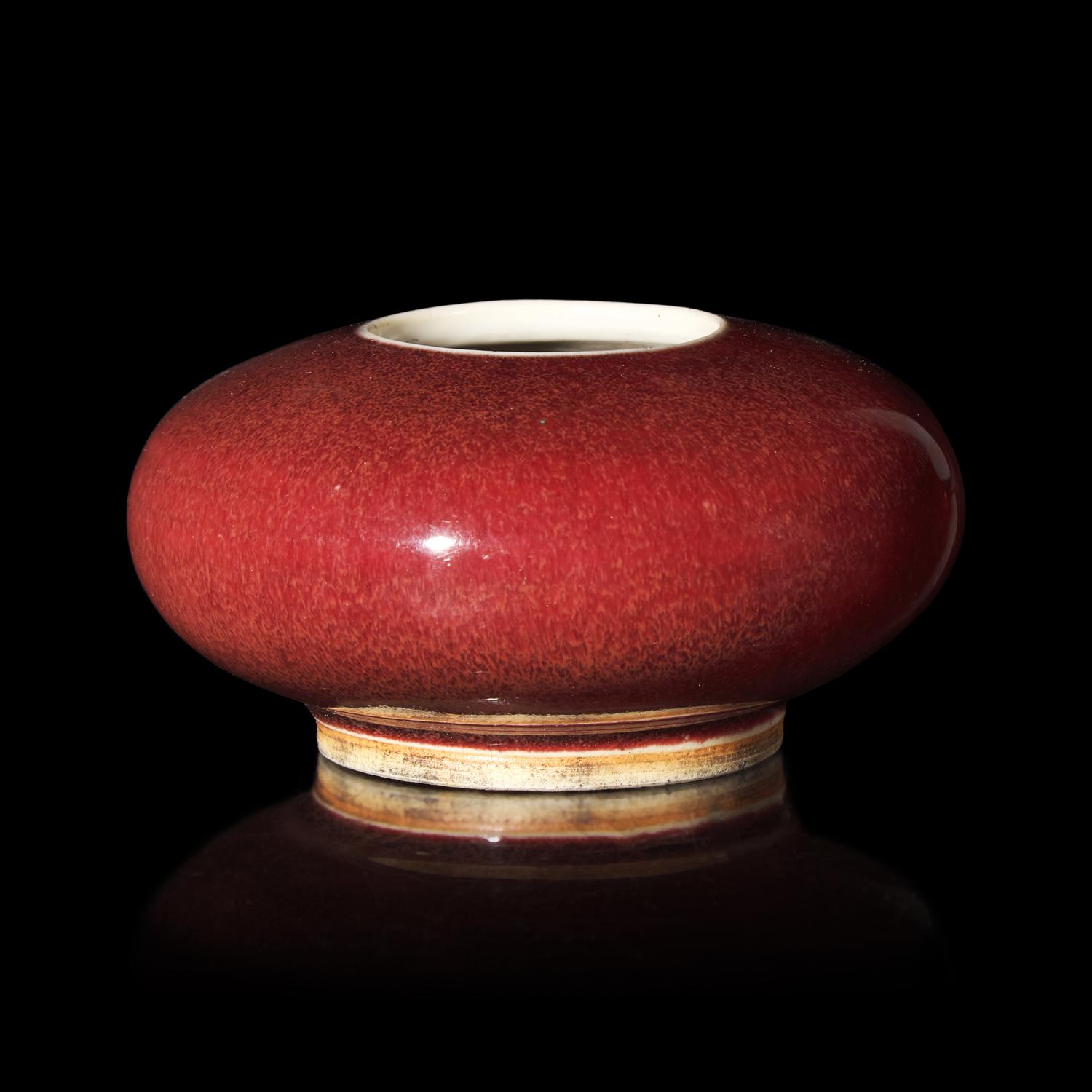 A Chinese Copper Red Glazed Water Coupe, Qing Dynasty 清 寶石紅釉堂鑼洗