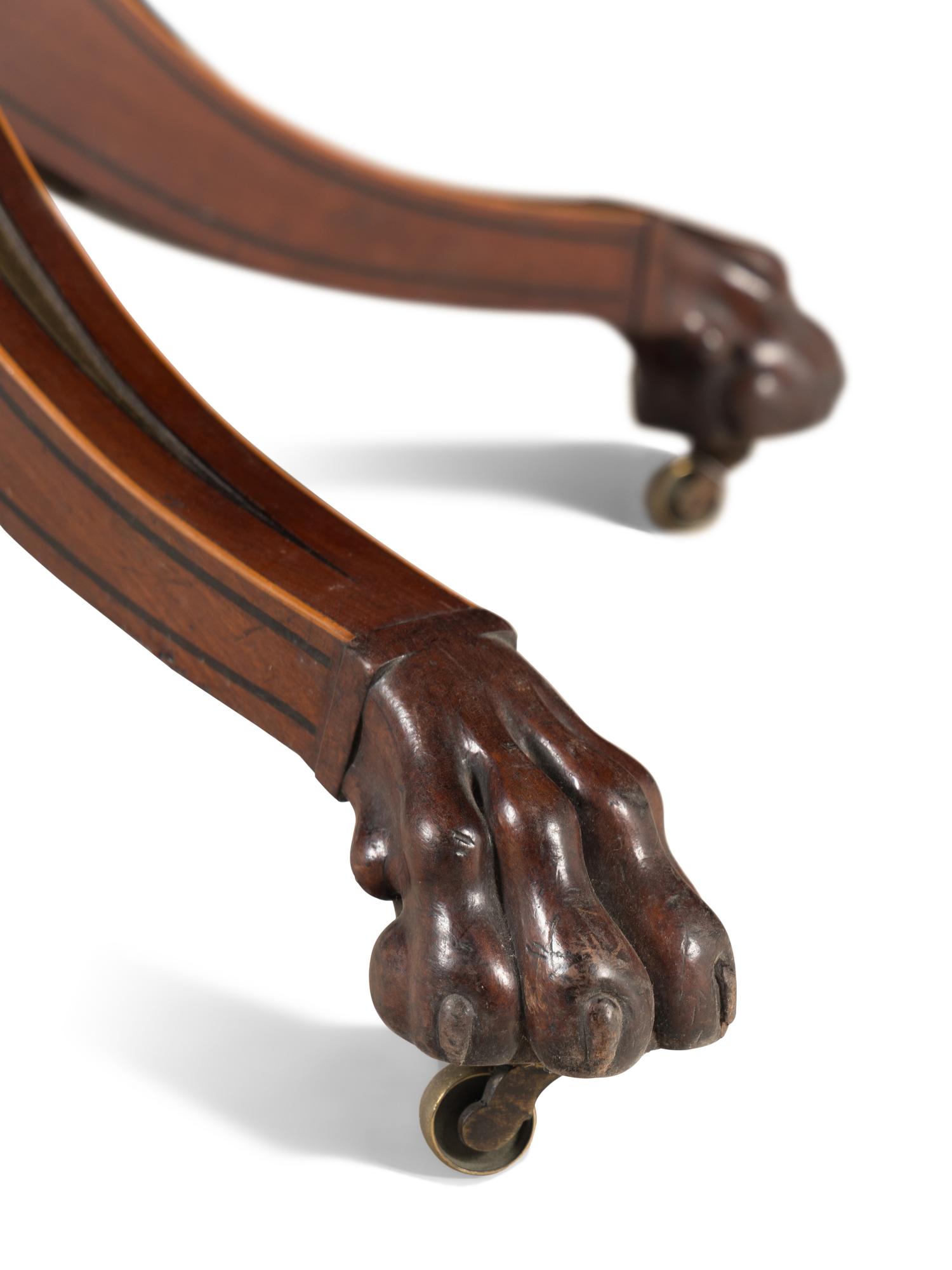 A Regency Part Ebonized Mahogany Brass-Inlaid Breakfast Table
