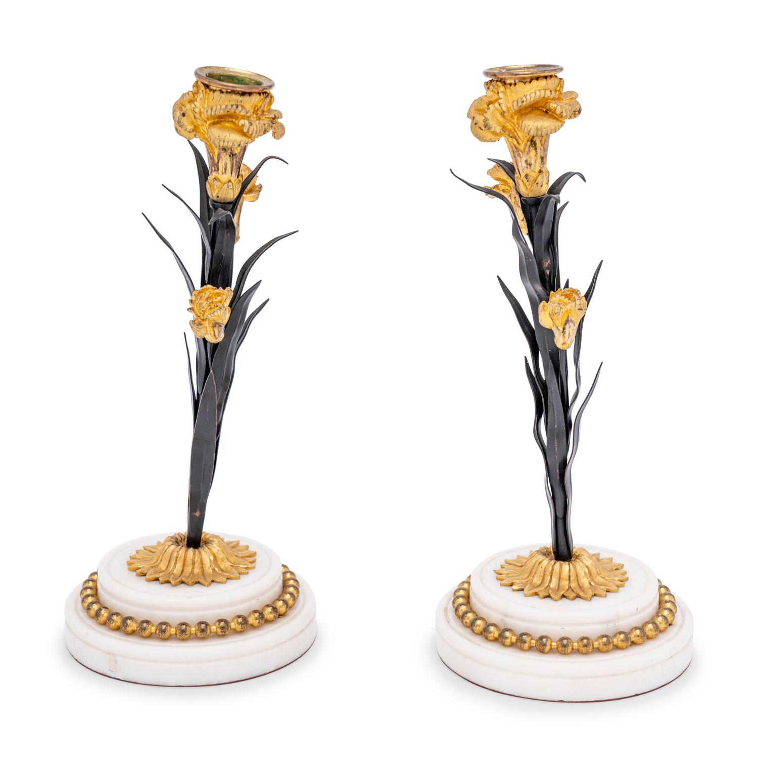 A Pair of French Tôle, Gilt Metal and Marble Candlesticks