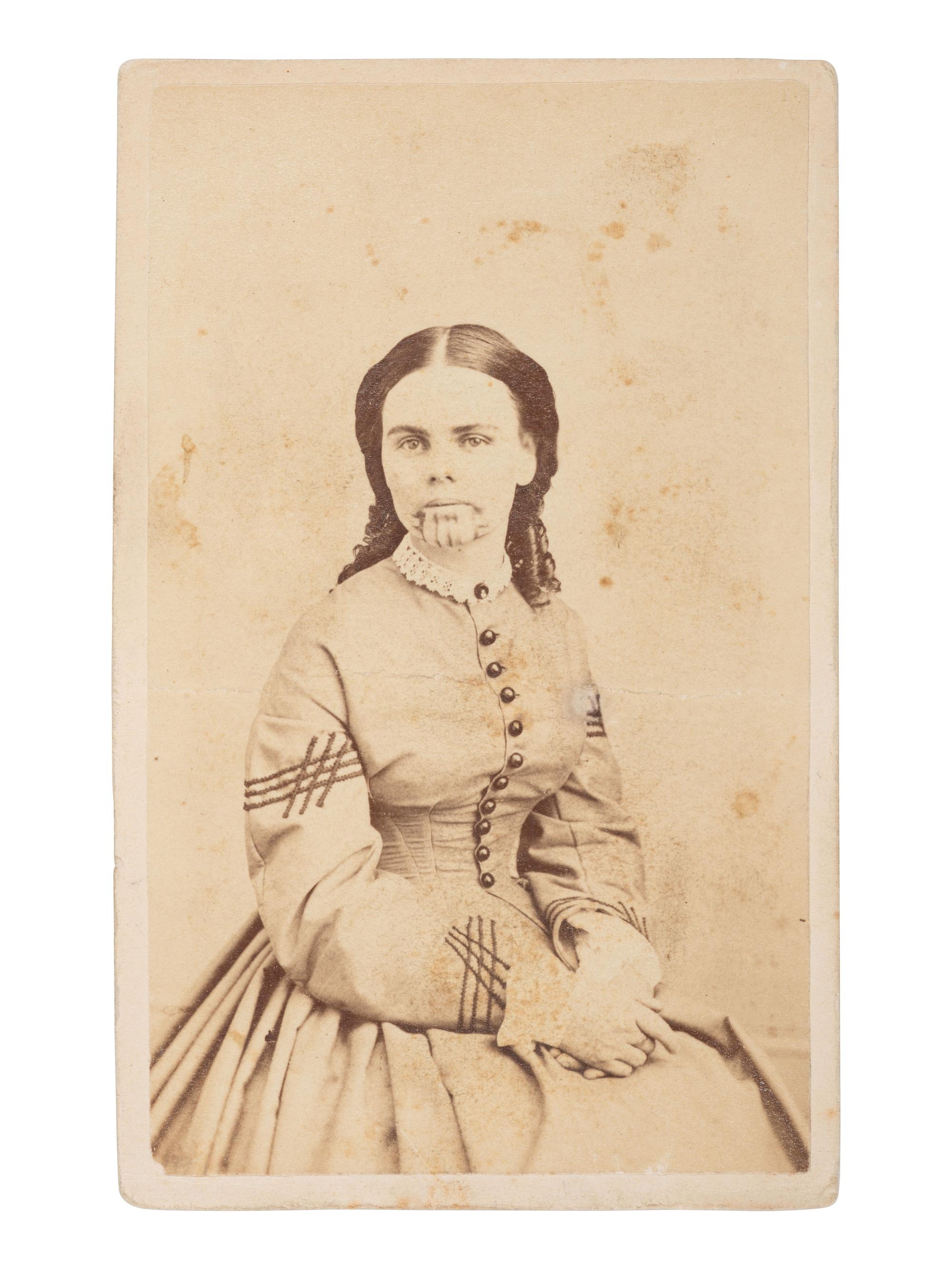 [EARLY PHOTOGRAPHY]. CDV portrait of Olive Oatman, taken and held captive by Native Americans for 5 years. Rochester, NY: Powelson.