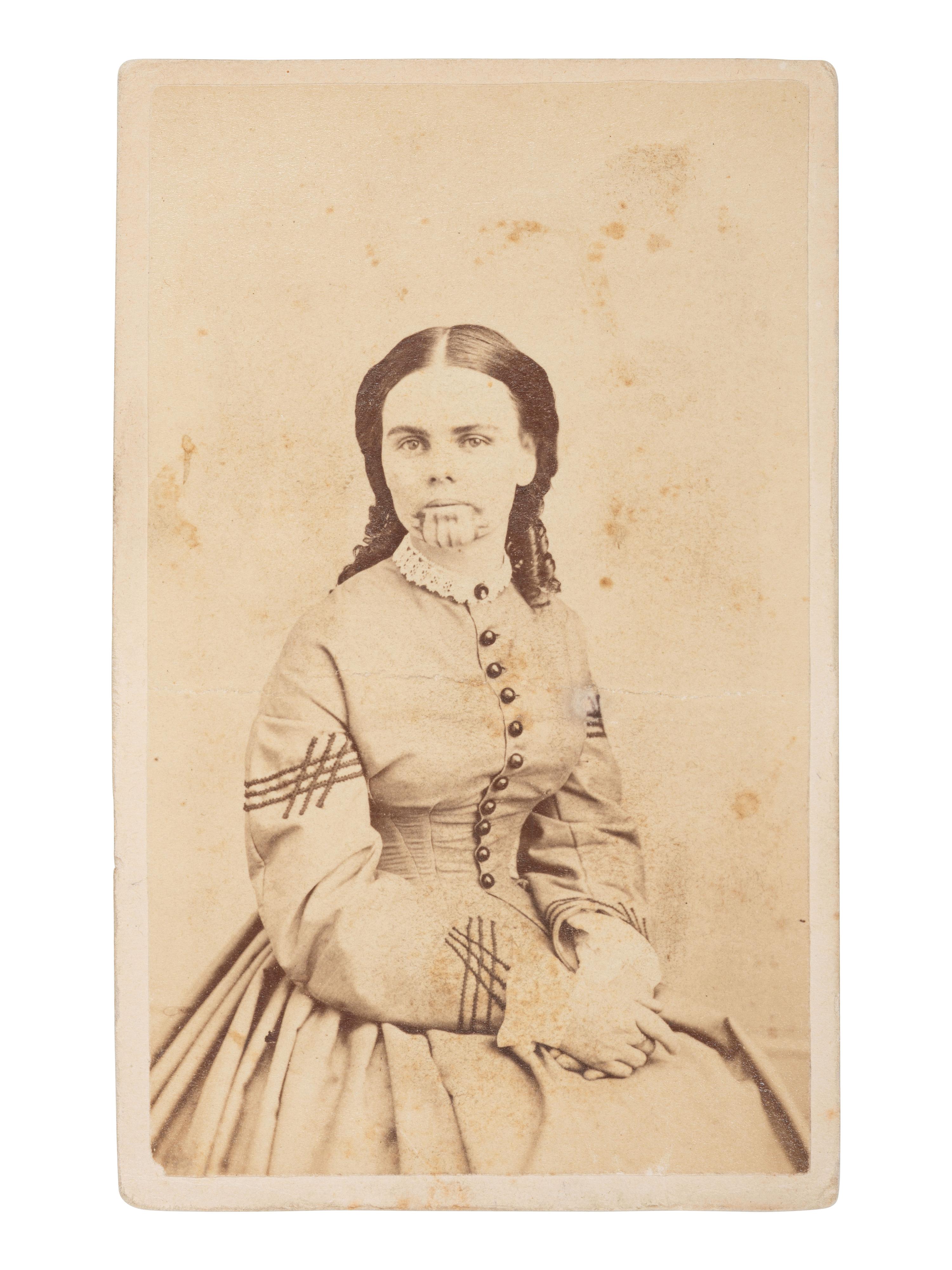 [EARLY PHOTOGRAPHY]. CDV portrait of Olive Oatman, taken and held captive by Native Americans for 5 years. Rochester, NY: Powelson.