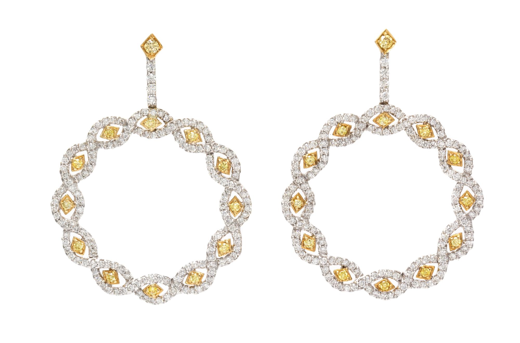 A Pair of Bicolor Gold, Colored Diamond and Diamond Pendant Earrings, 8.60 dwts.