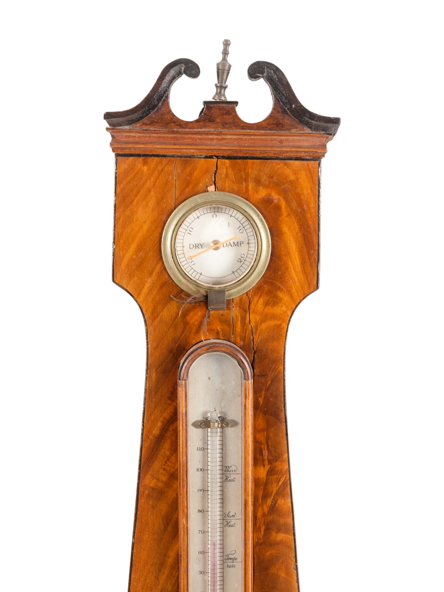 A Regency Mahogany Wheel Barometer