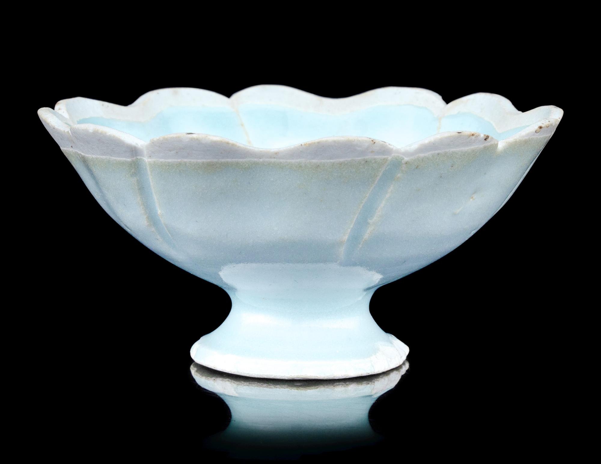 A Yingqing Glazed Porcelain 'Foliate' Footed Bowl