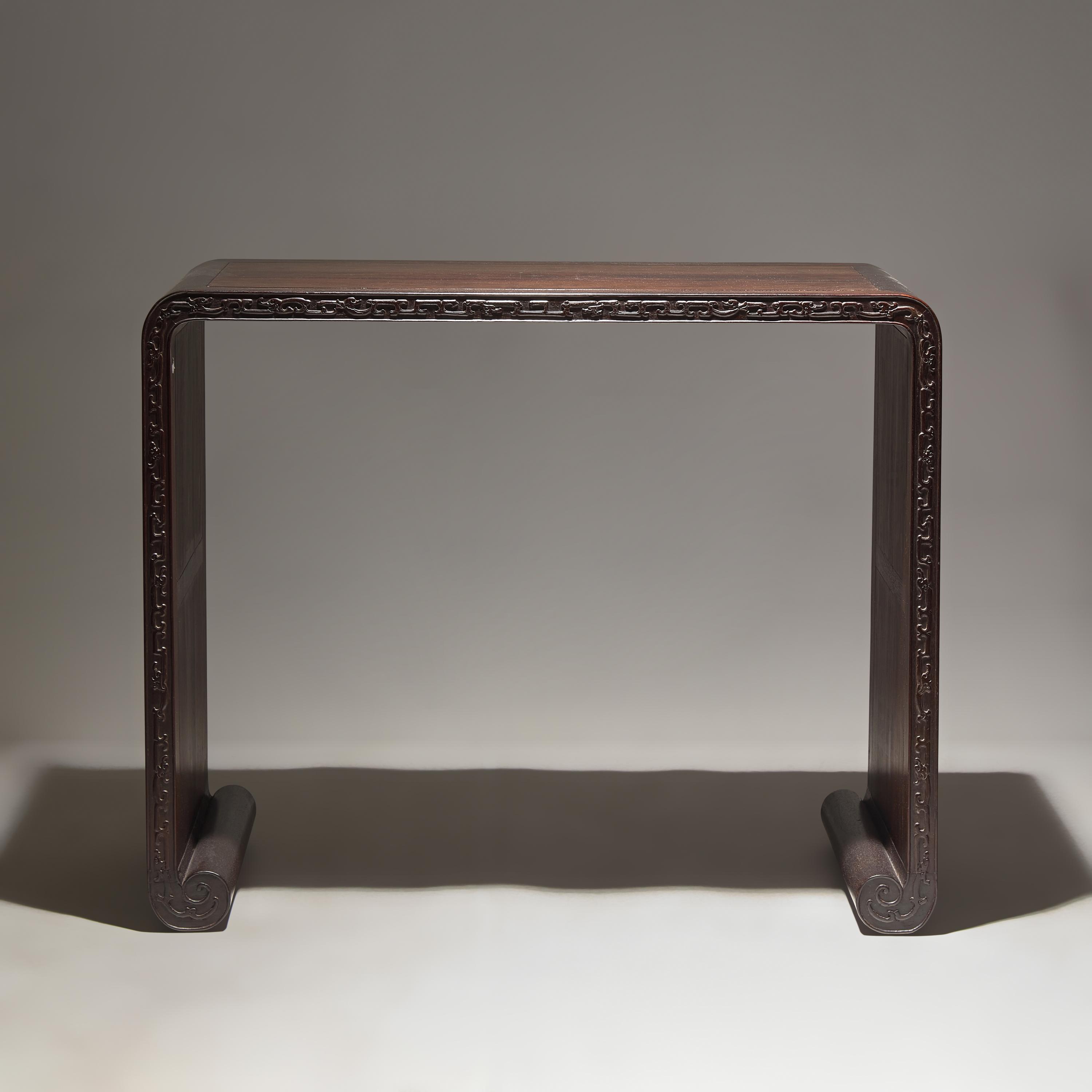 A Chinese Zitan and Hardwood Scroll-Form Altar Table — 紫檀及硬木夔龍紋下卷式小條案
