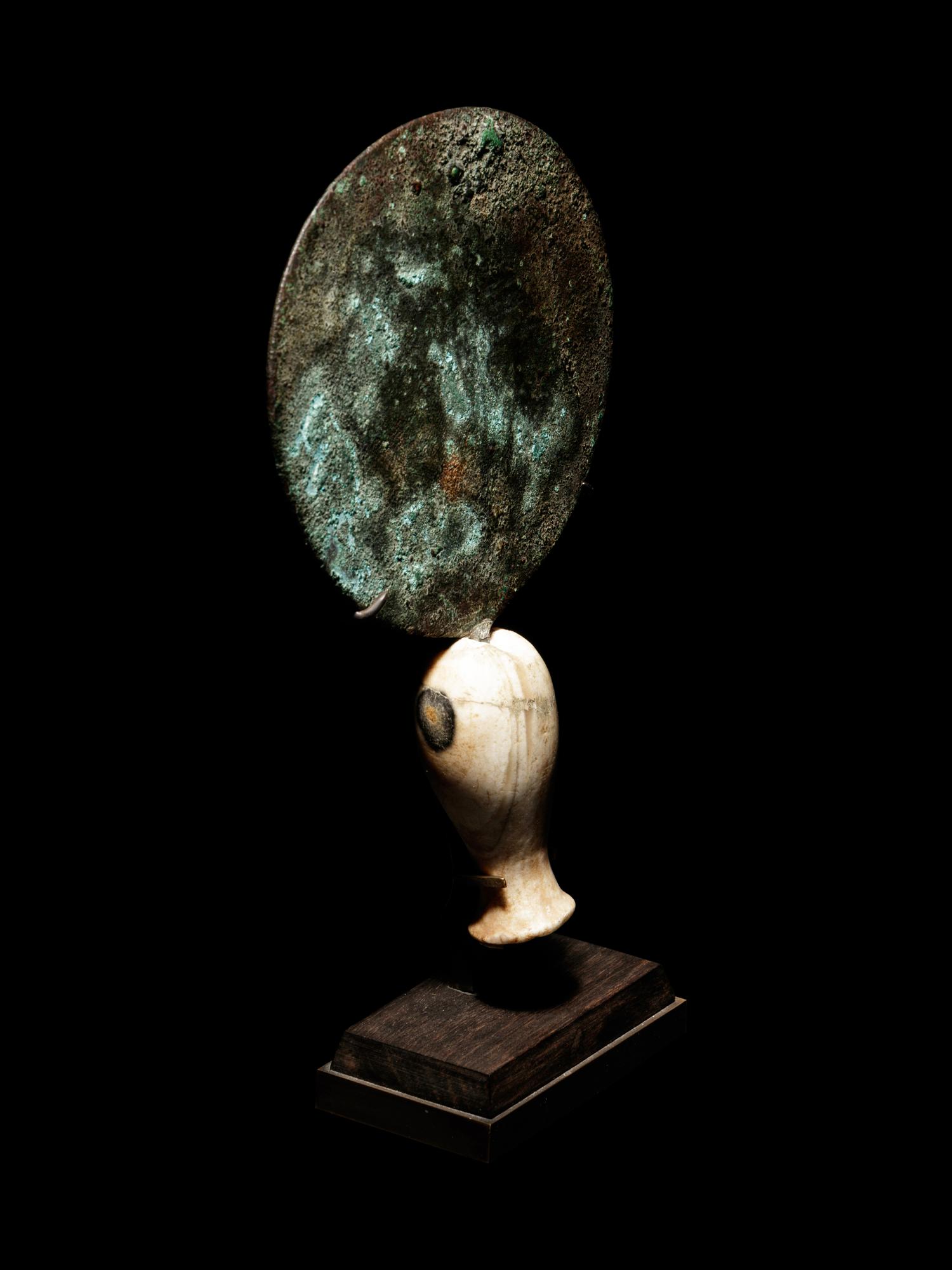 An Egyptian Bronze Mirror