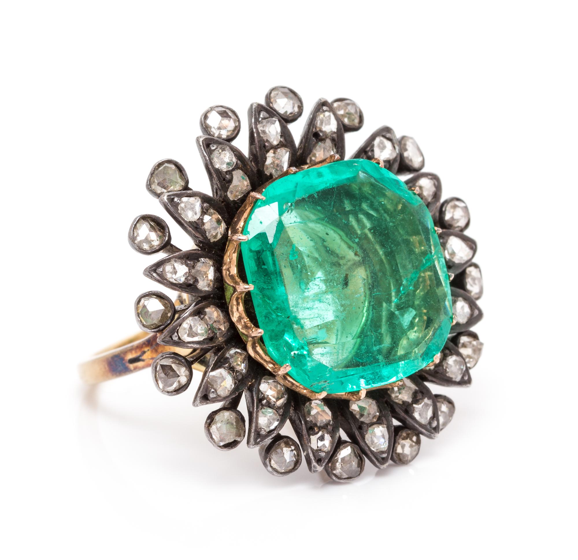 A Victorian Silver, Yellow Gold, Emerald and Diamond Ring, 6.80 dwts.