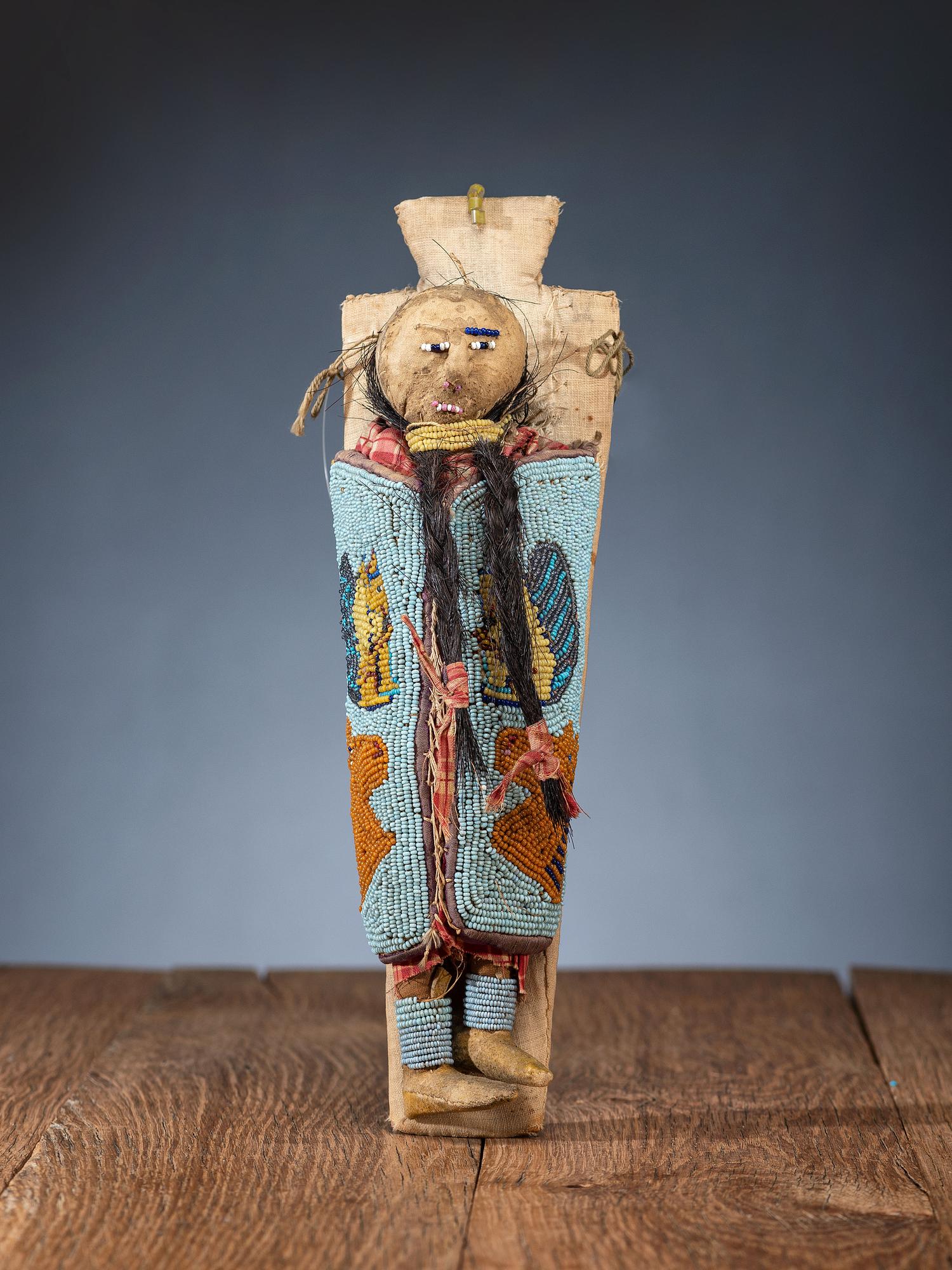 Nez Perce Beaded Pictorial Toy Cradle, with Doll