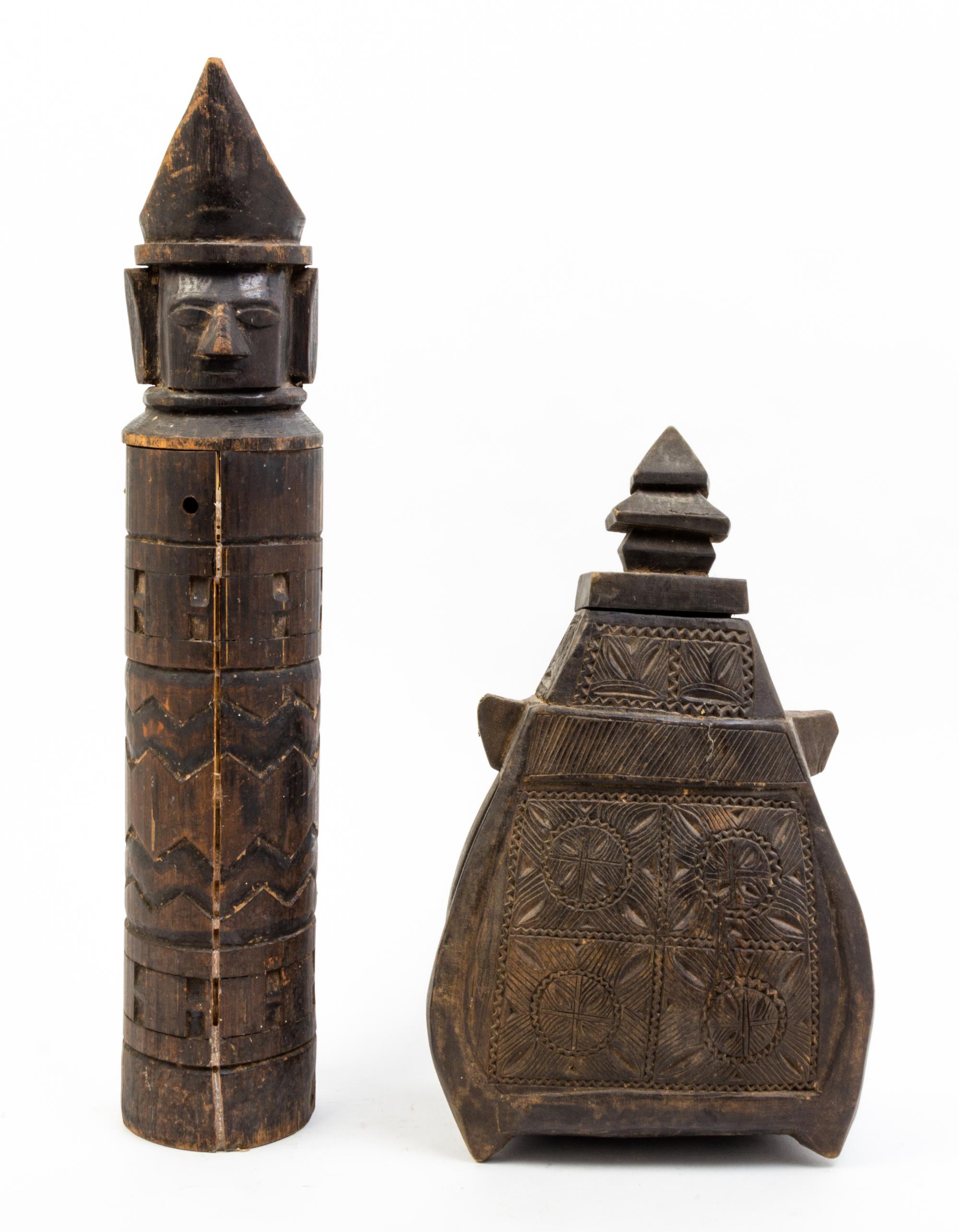 A Batak Wood Medicine Container Height of first 21 3/4 inches.