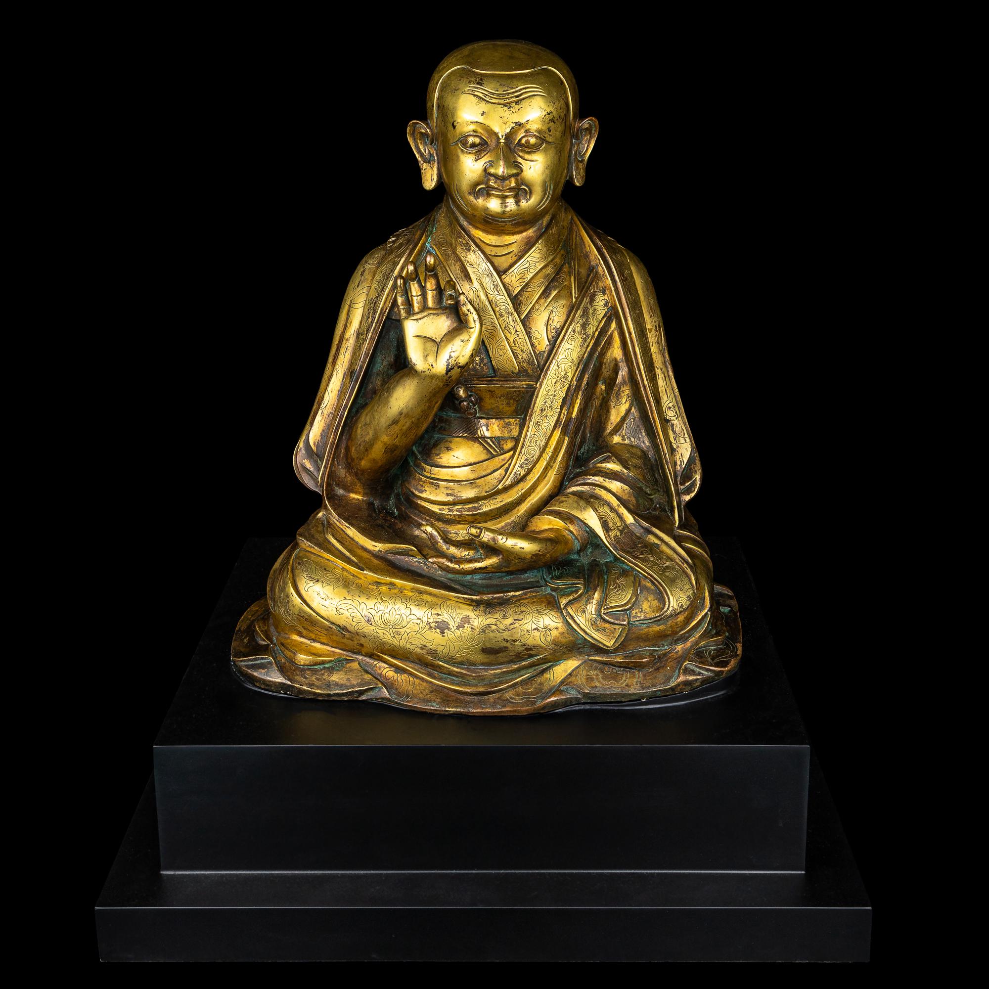 A Large Sino-Tibetan Gilt Bronze Figure of a Lama 巨型銅鎏金上師坐像