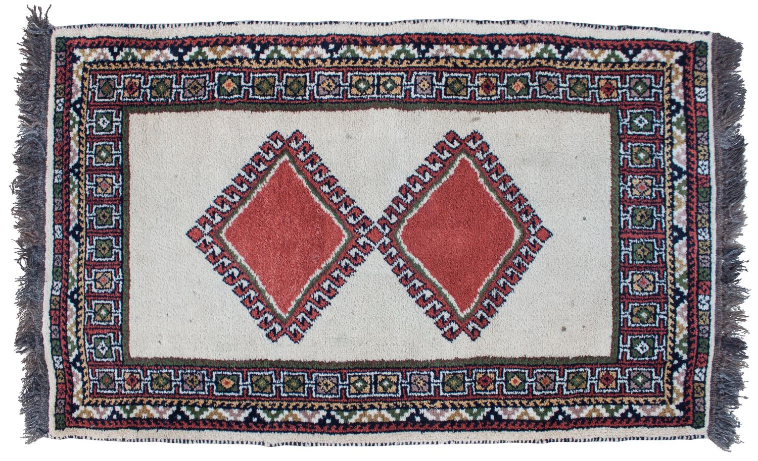 A Broadloom Wool Rug 5 feet 5 inches x 3 feet 5 inches.