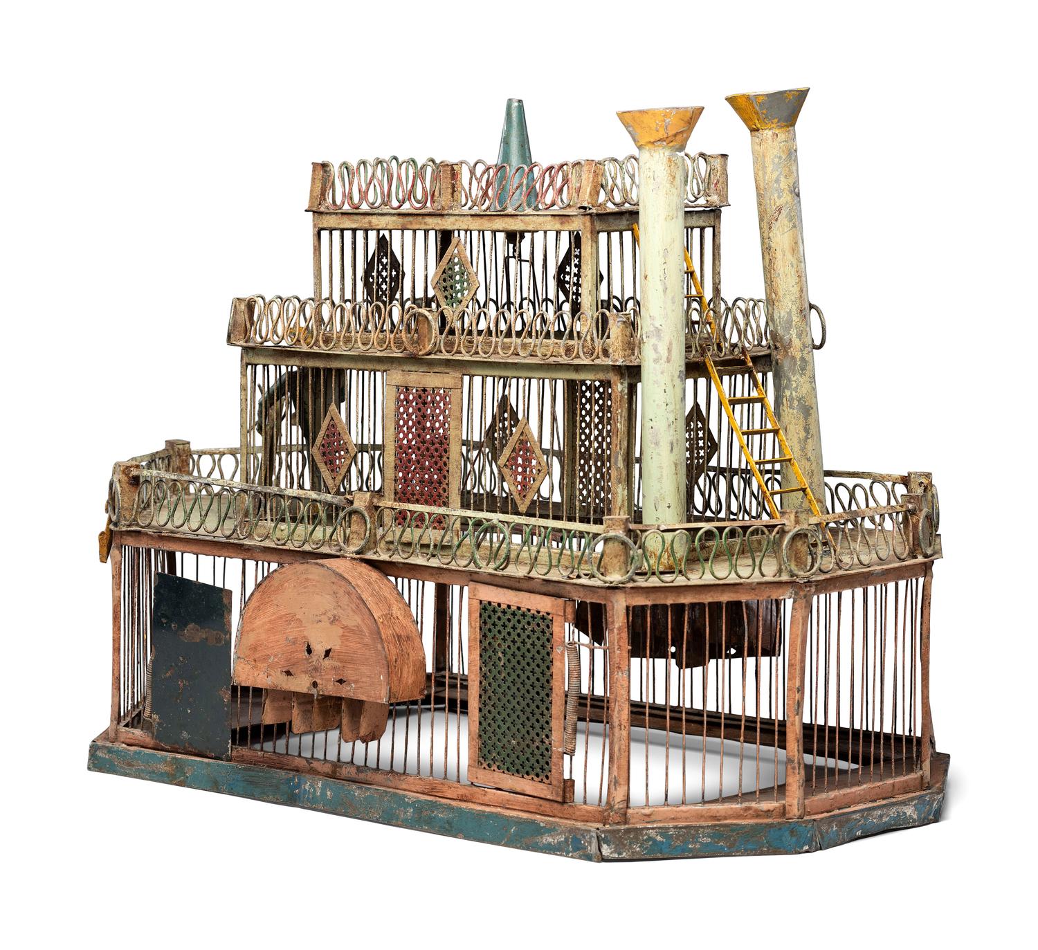 A Folk Art Cut and Painted Metal Paddleboat Form Birdcage