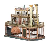 A Folk Art Cut and Painted Metal Paddleboat Form Birdcage