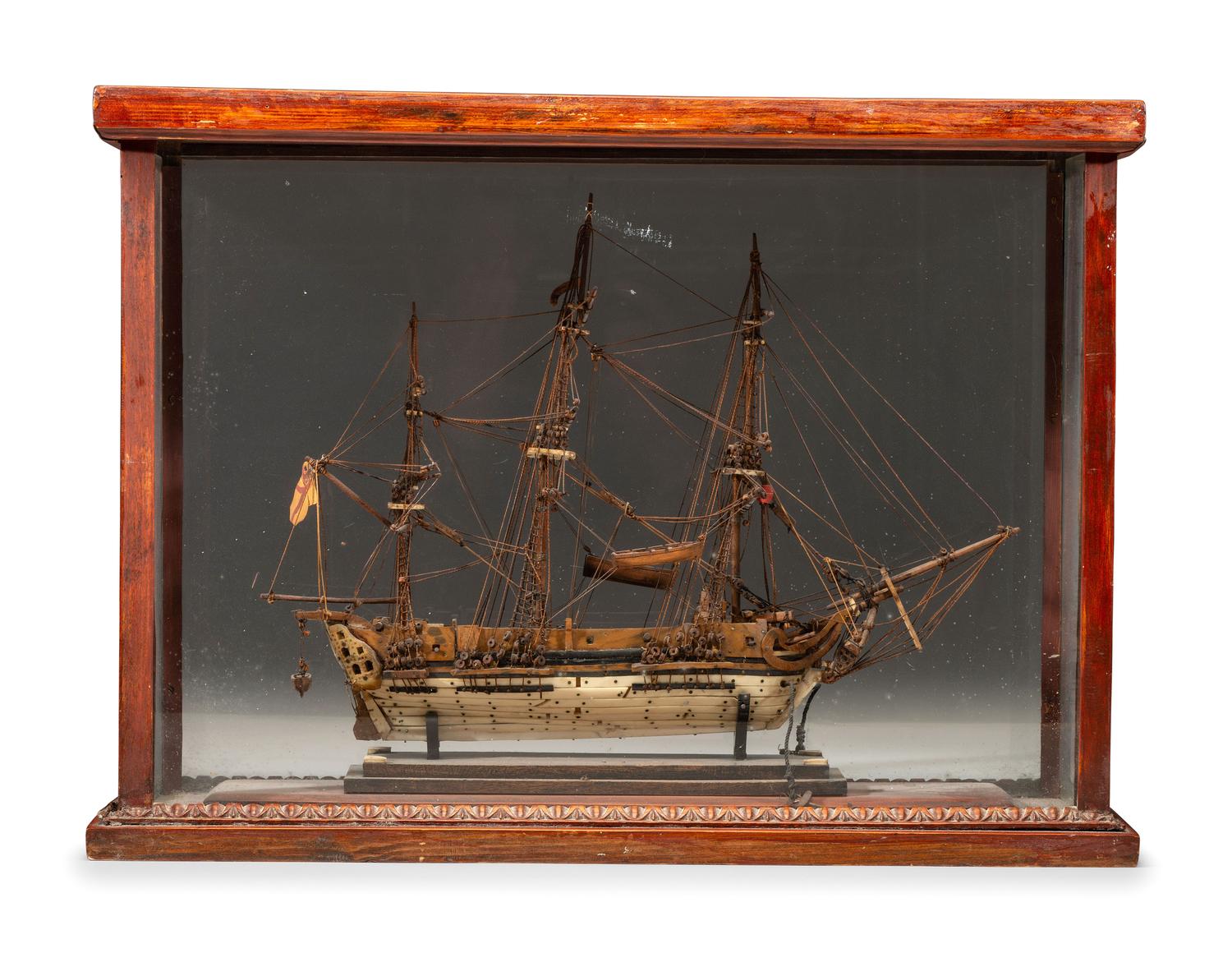 A French Prisoner of War Carved Bone and Wood Model of a British Warship
