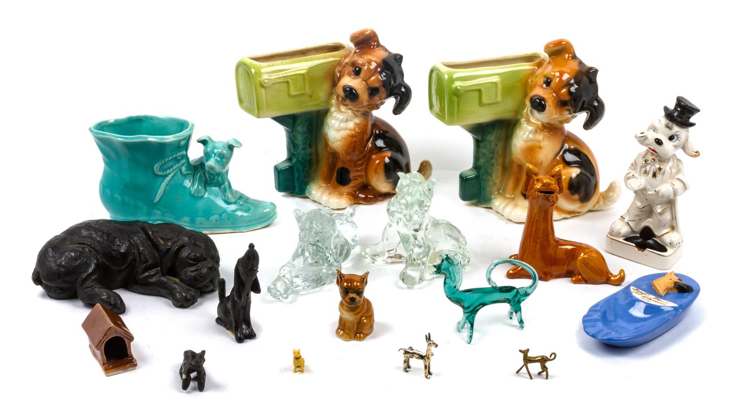 A Group of Nineteen Bulldog Figures and Articles Height of tallest 14 3/4 inches.