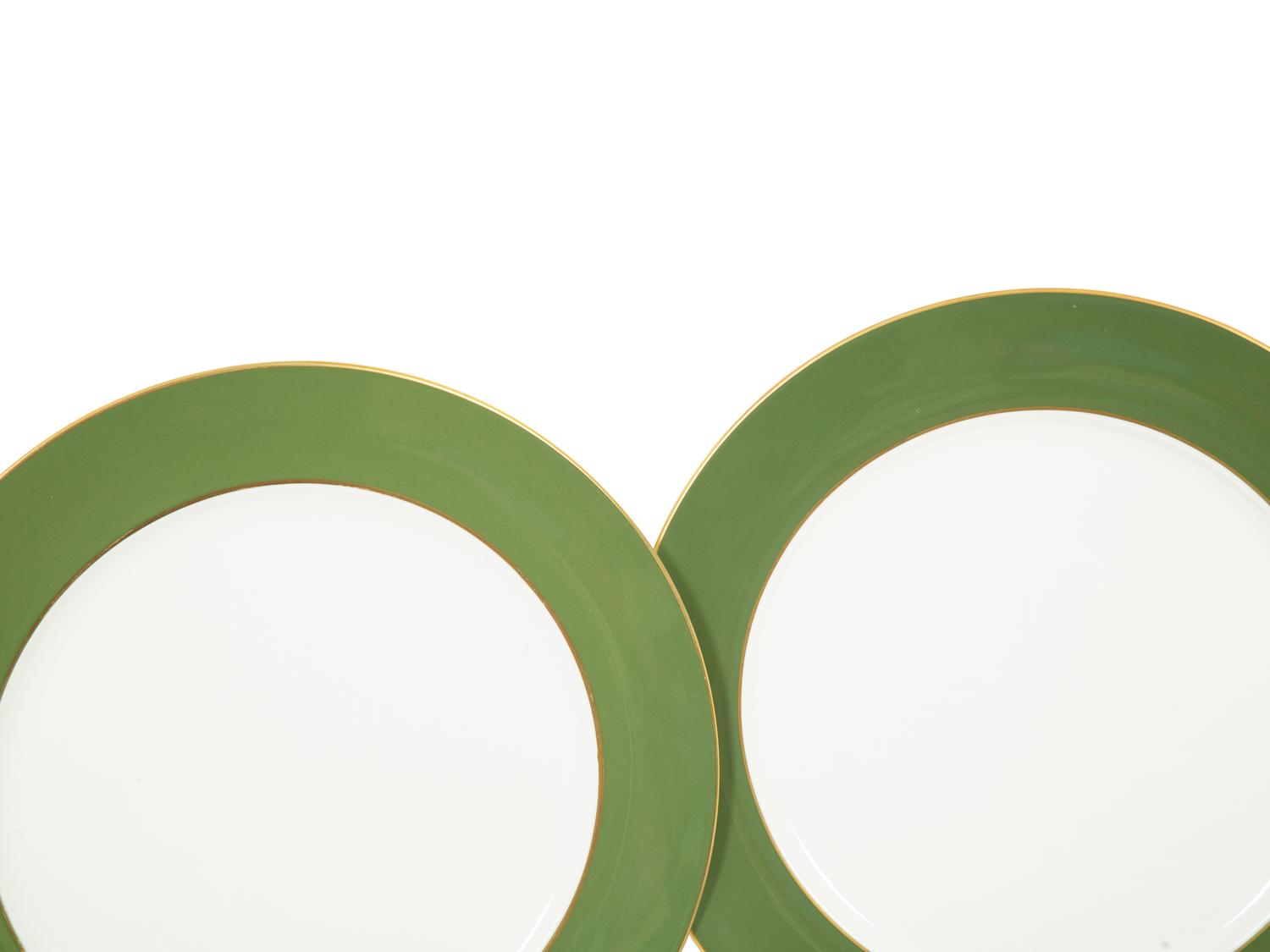 A Set of Fourteen Royal Crown Derby Green Band Chargers