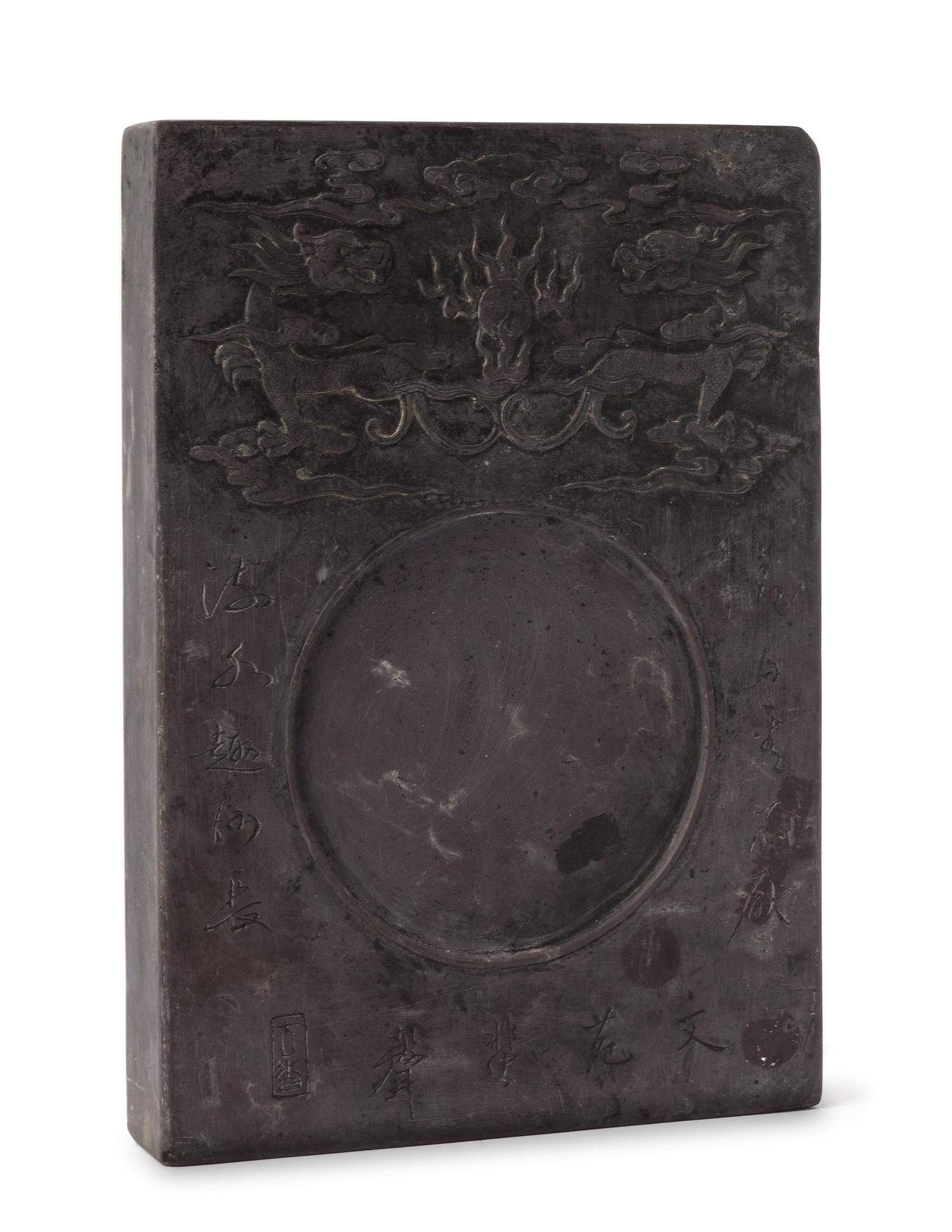 A Carved Inkstone Height 11 1/8 x width 7 7/8 inches.
