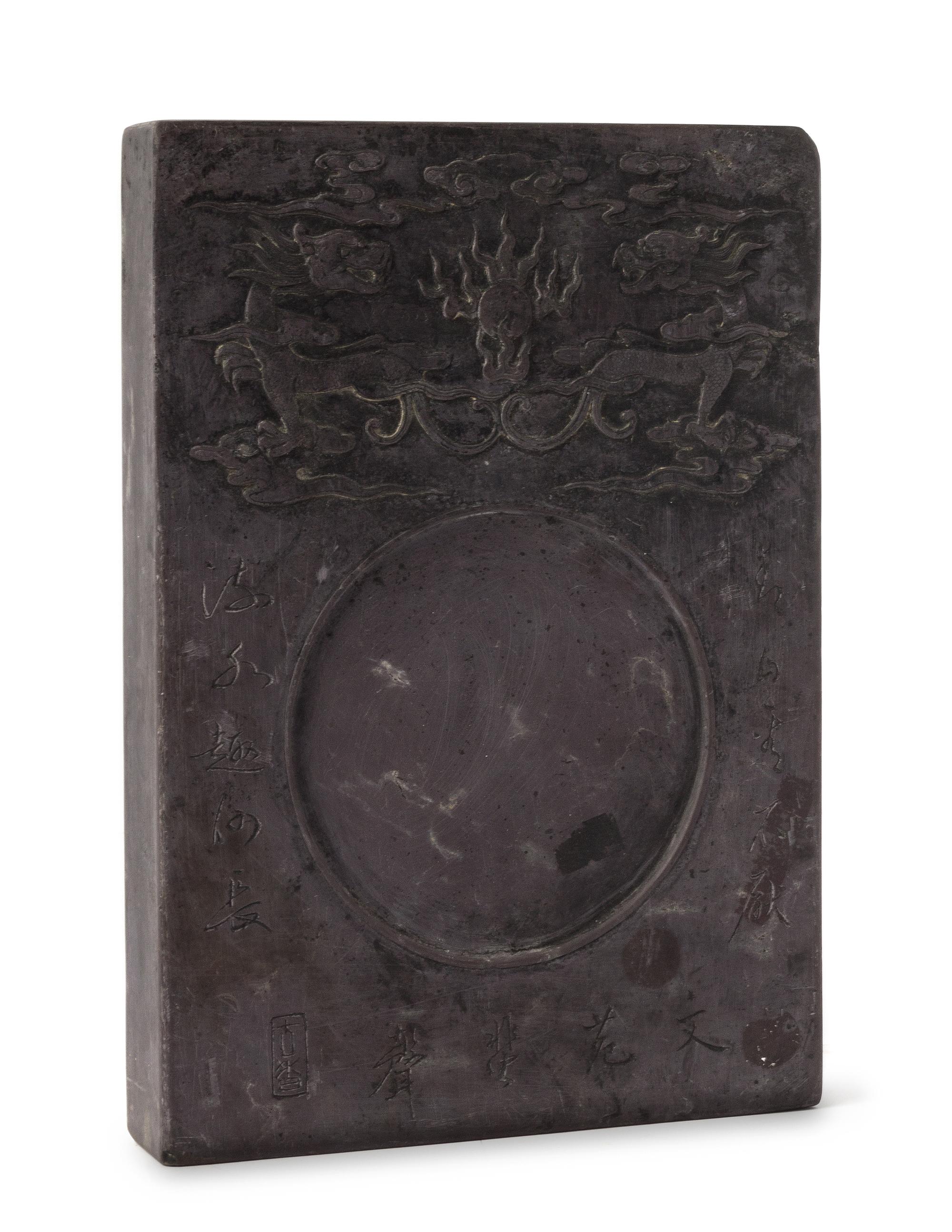 A Carved Inkstone Height 11 1/8 x width 7 7/8 inches.