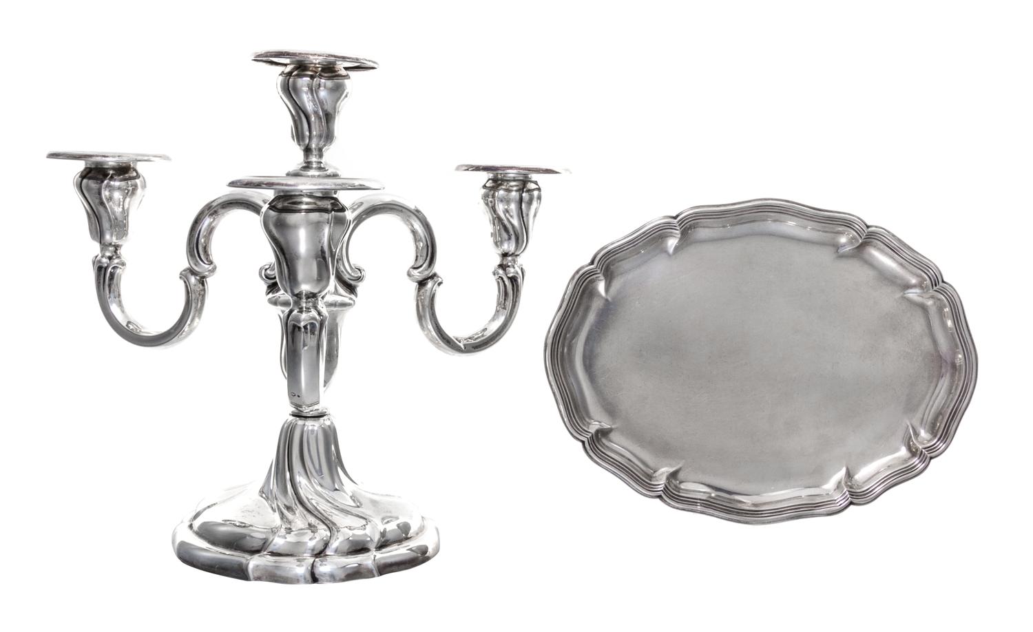 A German Silver Four Light Candelabrum, FJ Schroder, Berlin, having three S-scroll arms surrounding a central cup with a twist decorate