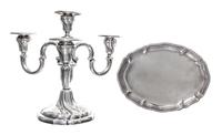 A German Silver Four Light Candelabrum, FJ Schroder, Berlin, having three S-scroll arms surrounding a central cup with a twist decorate