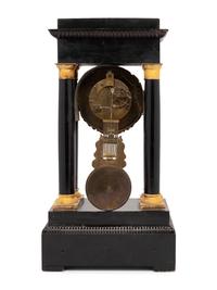 An Empire Style Gilt Bronze Mounted Ebonized Portico Clock