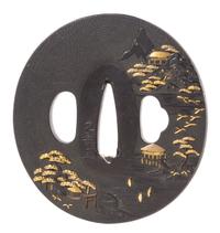 A Gilt Decorated Iron Tsuba Height 2 7/8 inches. — 19TH CENTURY