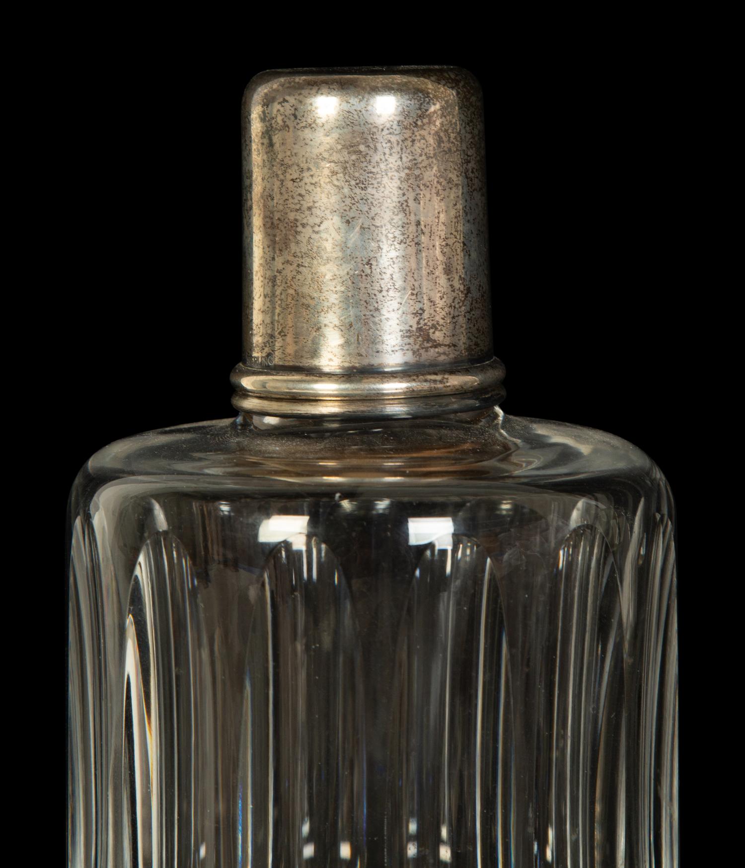 Four American Silver Mounted Cut Glass Decanters