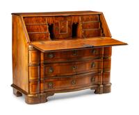 A Continental Parcel Gilt Walnut Slant-Front Bureau