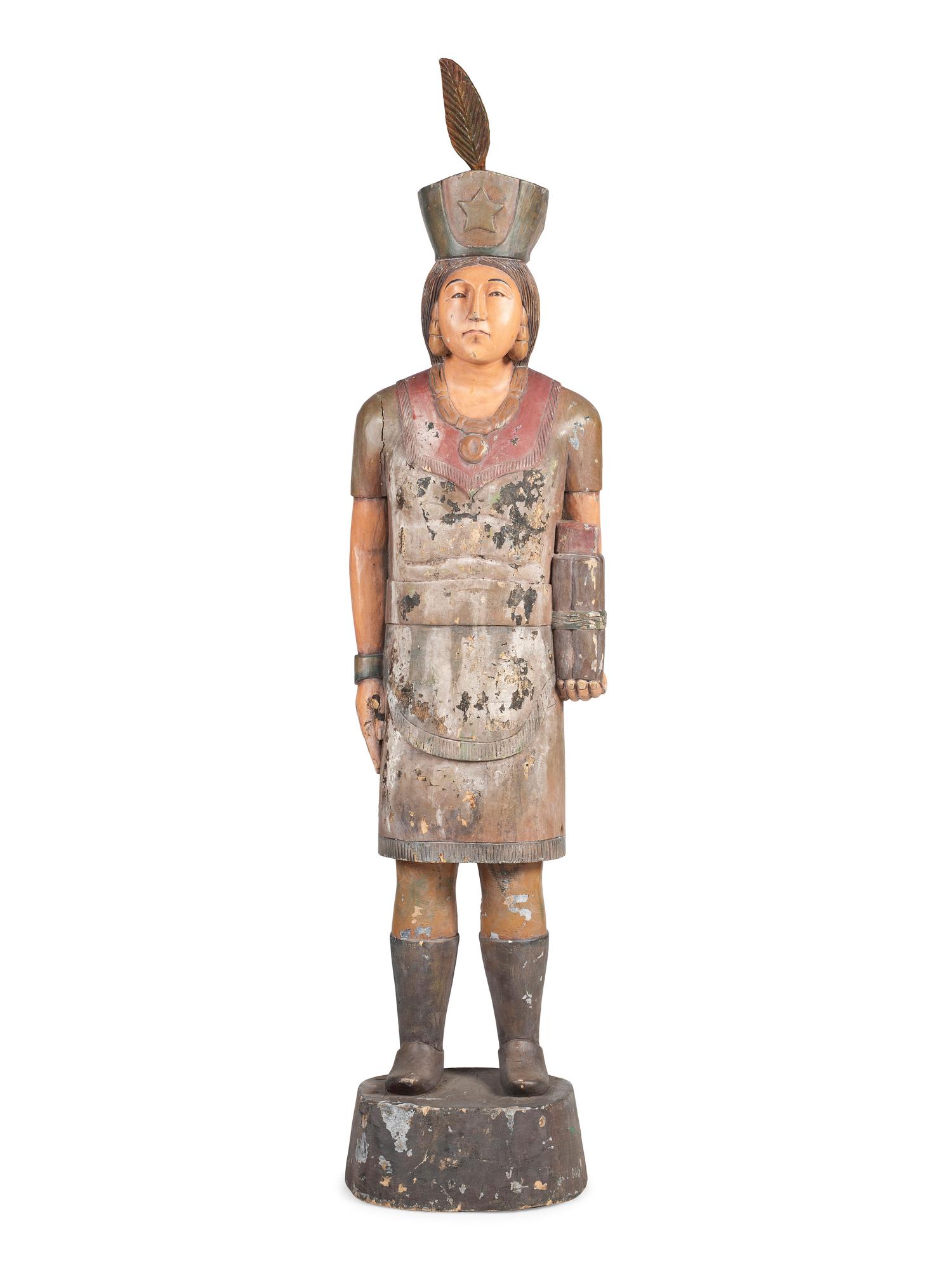 A Folk Art Carved and Painted Pine Native American Cigar Store Figure