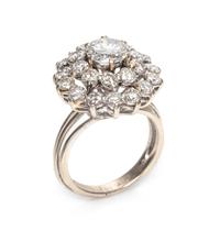 An 18 Karat White Gold and Diamond Cluster Ring,