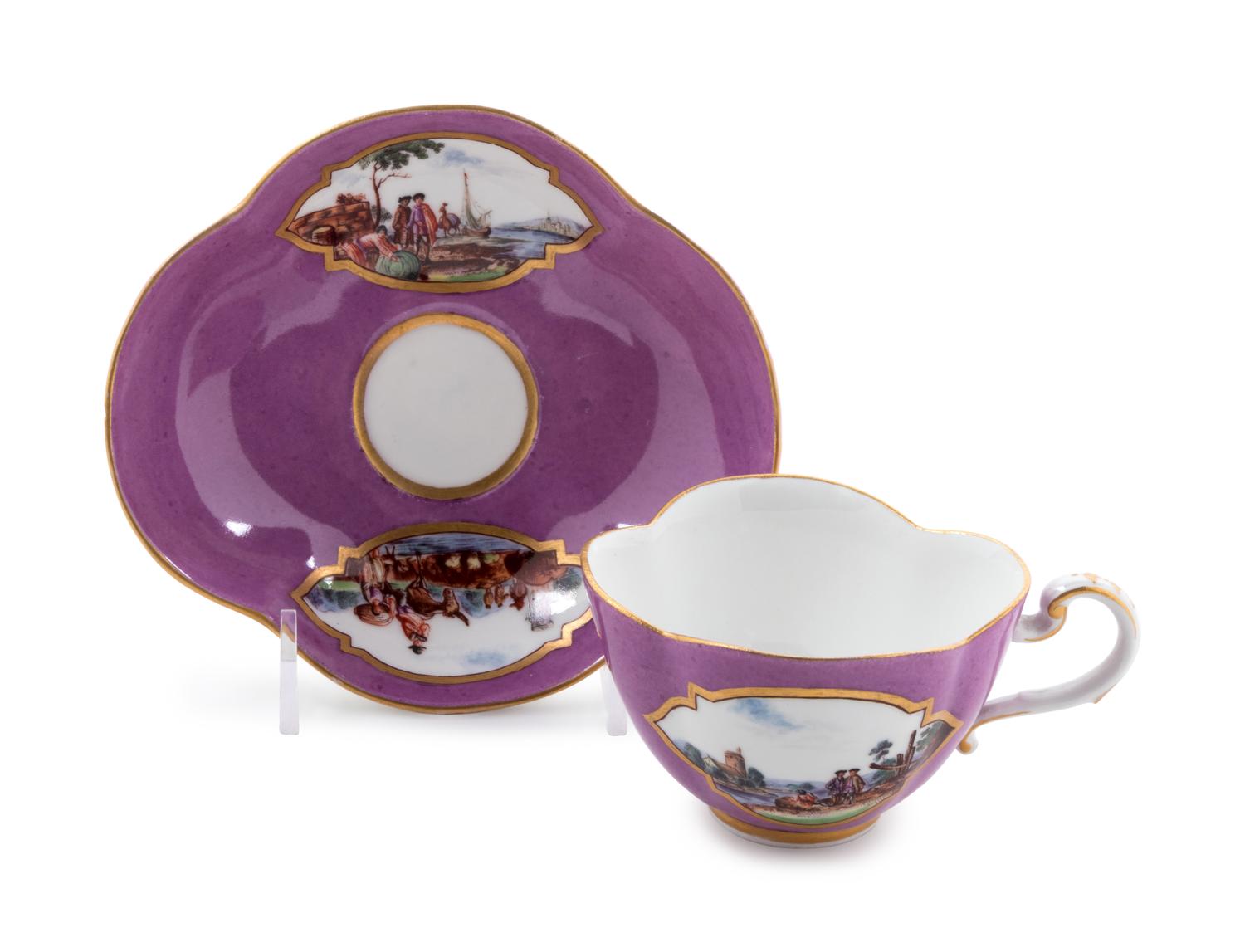 A Meissen Painted and Parcel Gilt Porcelain Teacup and Saucer