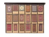 A Cased Set of Miniature Persian Rugs, Width overall 33 inches.