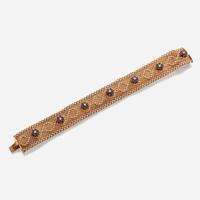 A gold, diamond, and ruby bracelet