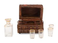 A French Musical Faux Book-Form Decanter Set