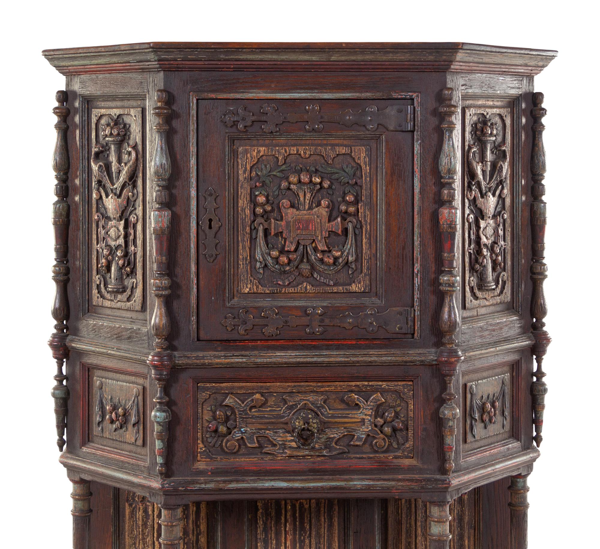 A Gothic Revival Oak Cabinet on Stand
