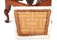 A Queen Anne Carved Walnut Armchair