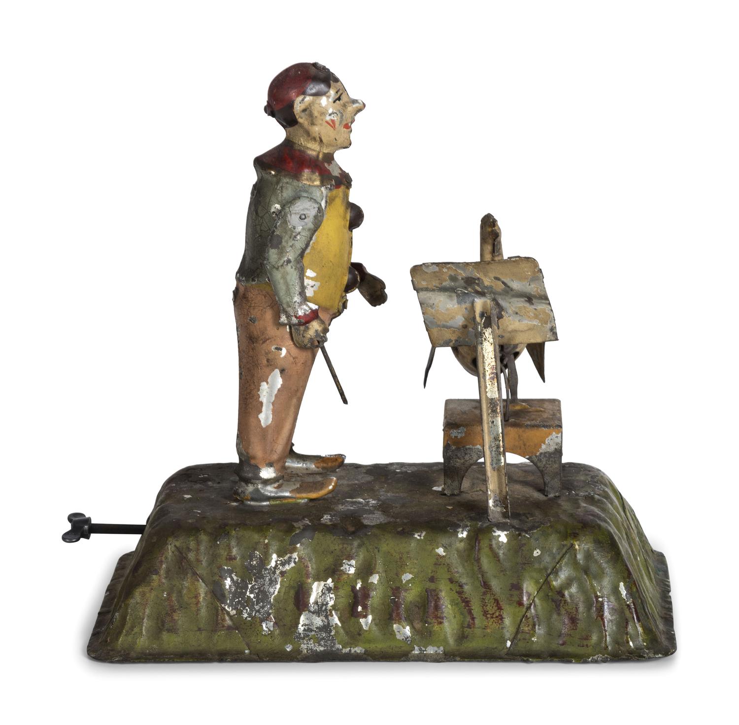 A Gunthermann Hand-Painted Tin and Paper Windup Toy