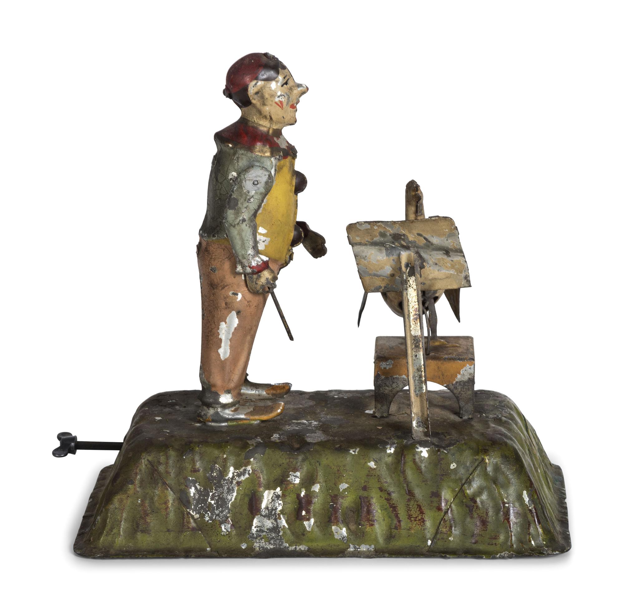 A Gunthermann Hand-Painted Tin and Paper Windup Toy