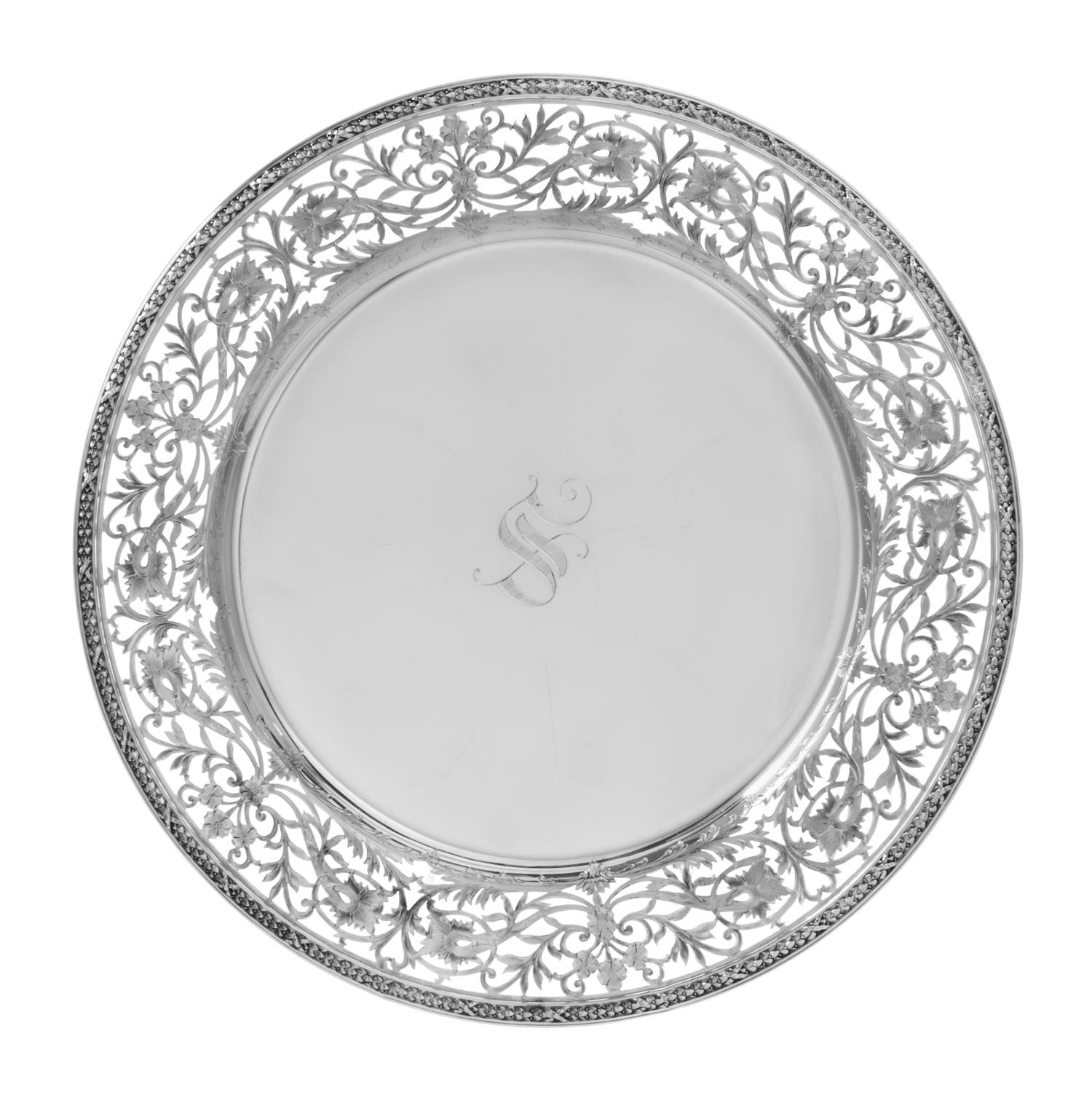 An American Silver Tray, Graff, Washbourne & Dunn, New York, NY, having a foliate swag decorated rim surrounding a pierced floral and f