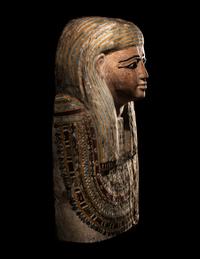 An Egyptian Polychrome Wood Mummy Mask