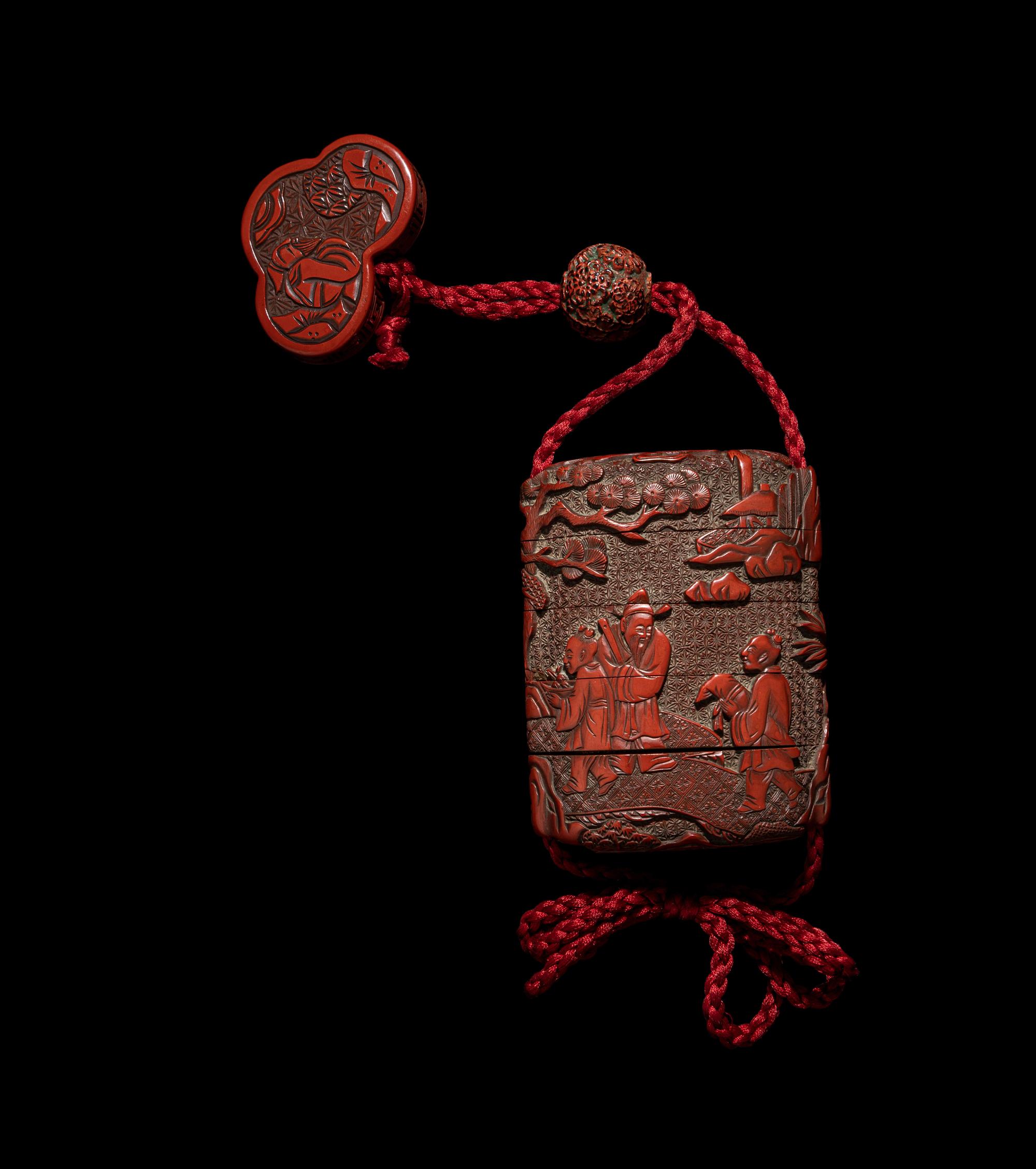 A Japanese Cinnabar Lacquer Four-Case Inro