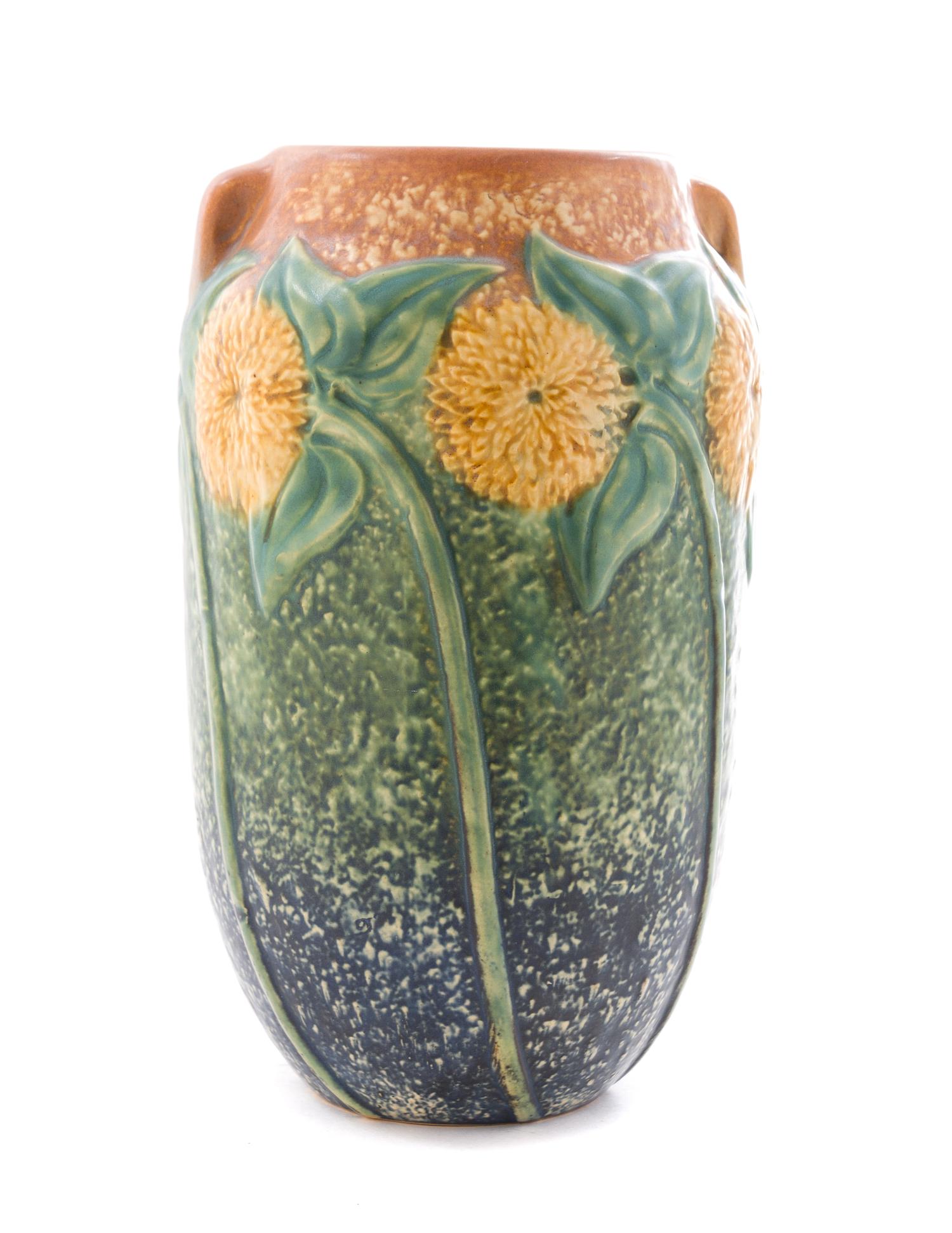 A Roseville Sunflower Pottery Vase Height 10 1/4 inches.