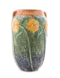 A Roseville Sunflower Pottery Vase Height 10 1/4 inches.