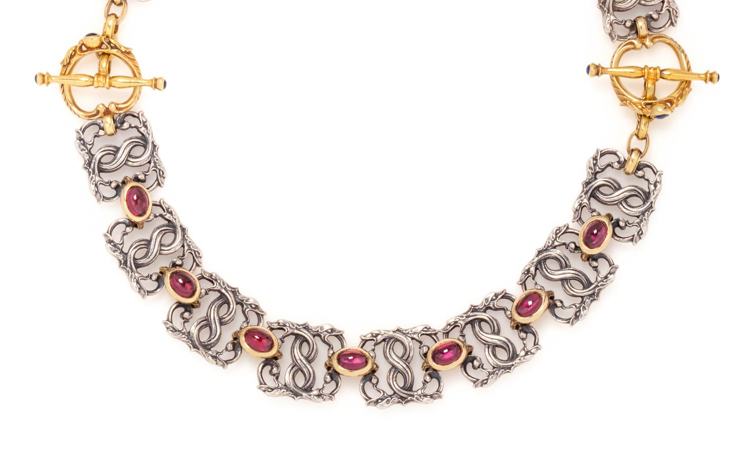 PAUL LANTUCH, PAIR OF STERLING SILVER, YELLOW GOLD AND GARNET BRACELETS