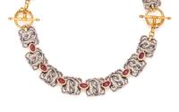 PAUL LANTUCH, PAIR OF STERLING SILVER, YELLOW GOLD AND GARNET BRACELETS