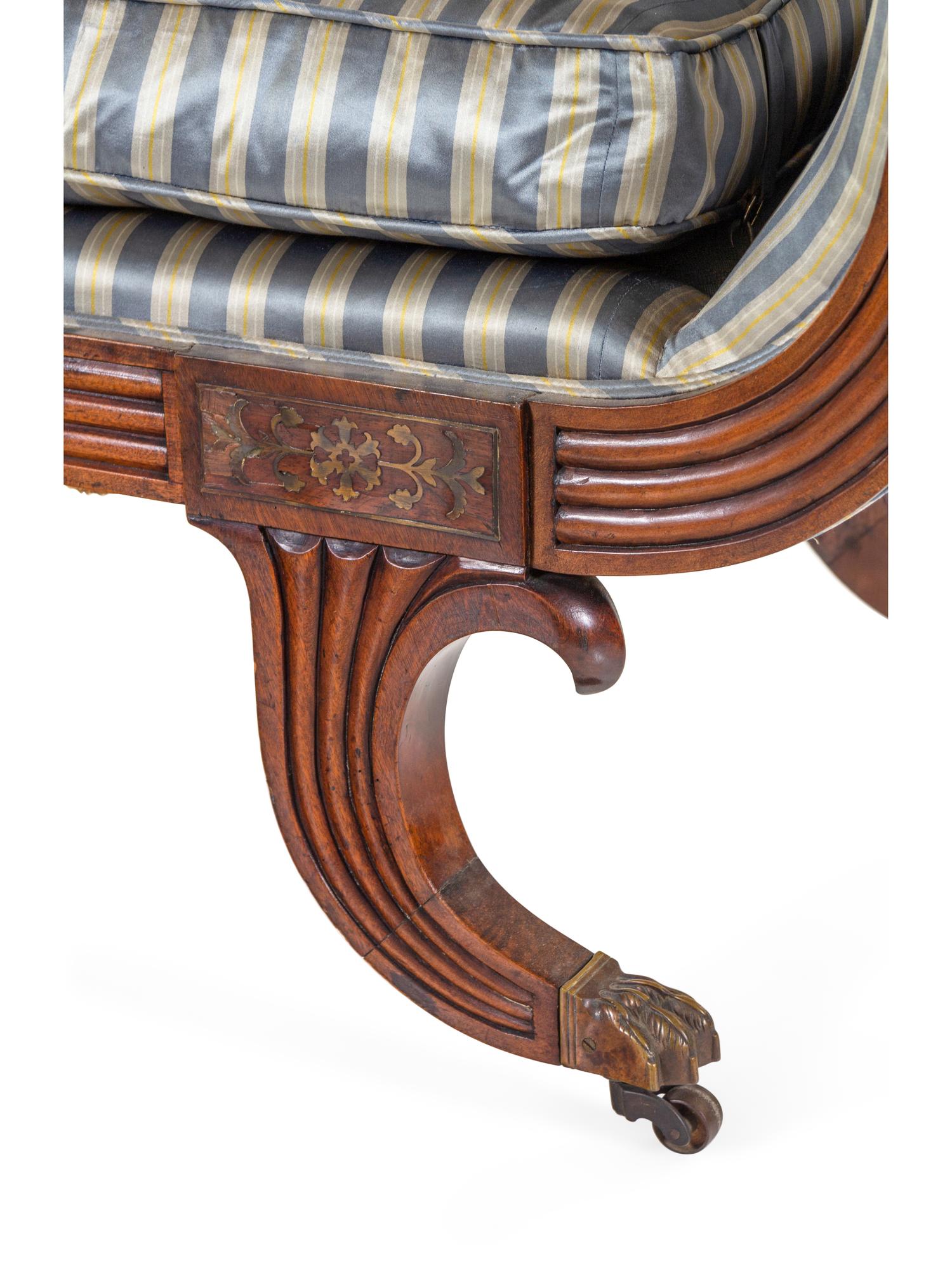A George IV Brass Mounted Carved and Figured Mahogany Sofa
